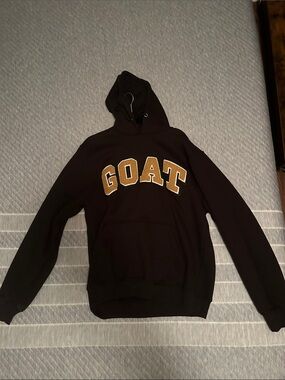 Nike Black Hoodie with Gold 'GOAT' Appliqué